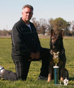 John with Bruno and their trophies for High IPO3 and High Protection